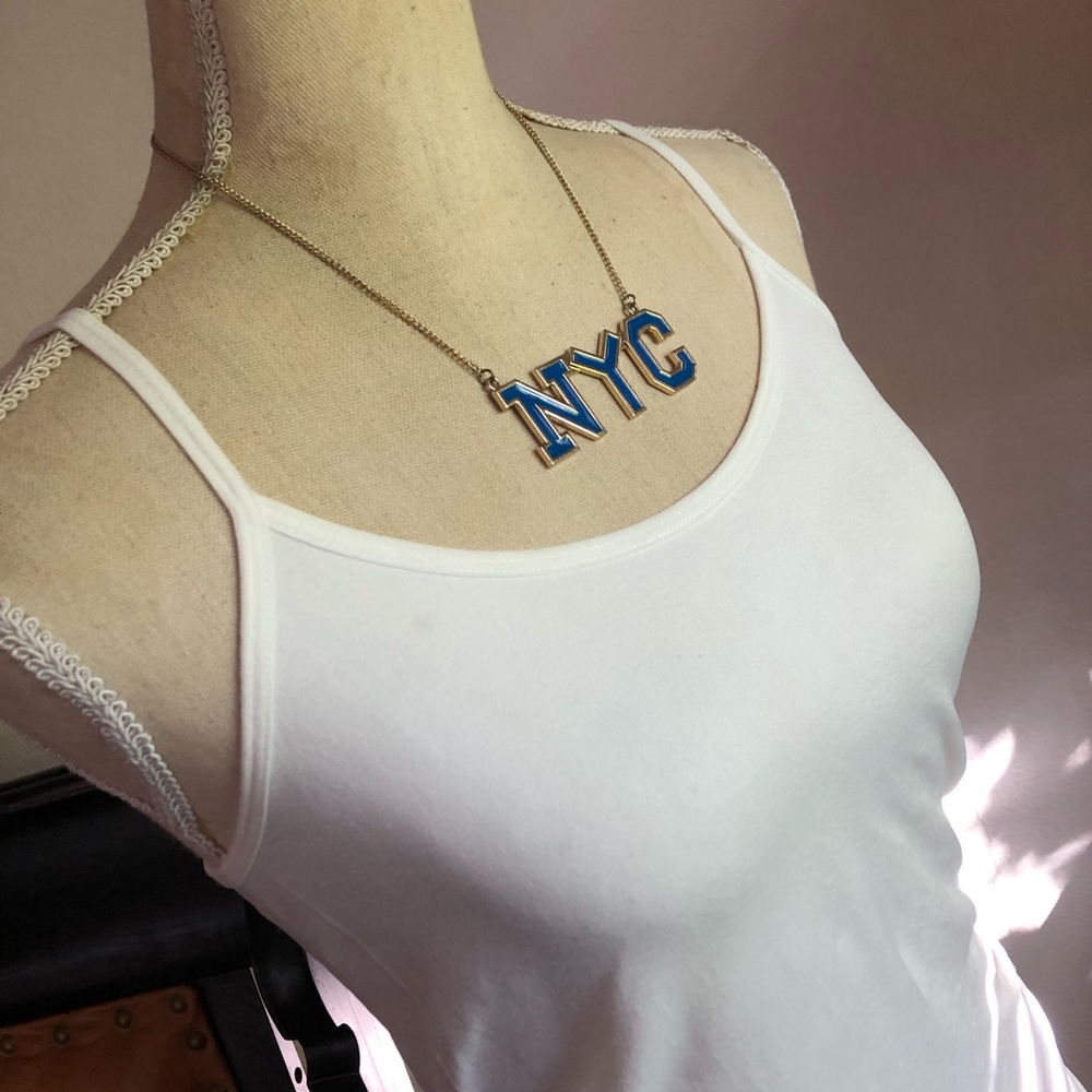 Bold NYC blue enamel gold tone setting pendant with chain